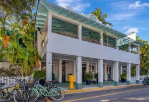 The exterior of a historic Key West hotel near the best museums to learn about the island's history. 