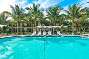 The pool area of a boutique hotel that's one of the most fun places to stay in Florida.