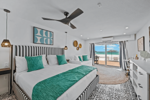 The bedroom of an Anna Maria Island rental to relax in after checking out holiday events.